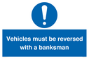 vehicles-must-be-reversed-with-a-banksman~